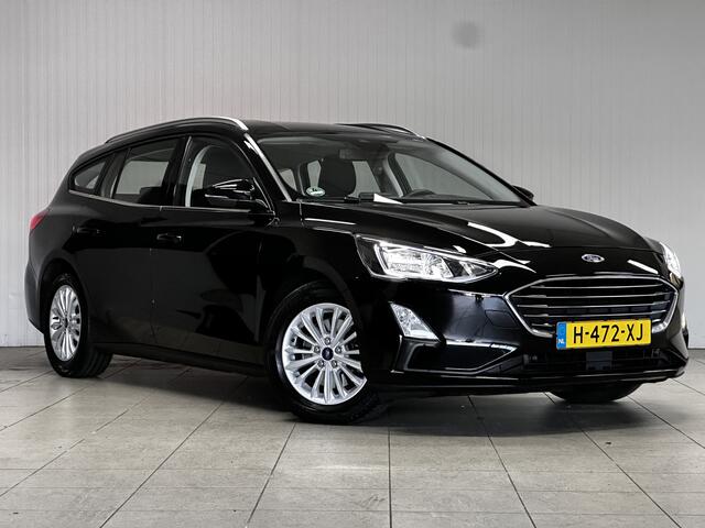 Ford FOCUS Wagon 1.5 EcoBlue Titanium Business/ Trekhaak/ Keyless/ 16'' LMV/ LED Koplampen/ Apple + Android/ DAB+/ Navi/ Clima/ Cruise/ Bluetooth/ Multi. LEDER. Stuur/ Mistl./ PDC V+A/ Chroom.