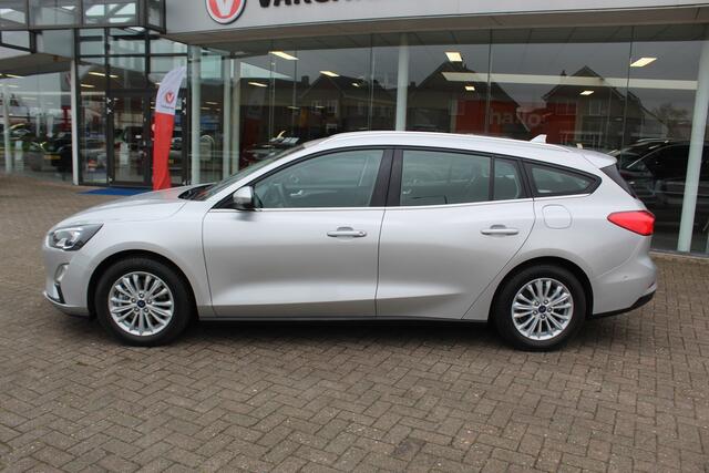 Ford FOCUS Wagon 1.0-125pk EcoBoost Mild-hybrid Titanium. Mooie, ruime, luxe en comfortabele Ford Focus wagon. Volautm. airco dual, camera, easy entry/easy go, stoel-, stuur- en voorraamverw., cruise control, Isofix, side- en lane assist, parkeersensoren v+a, LM wie