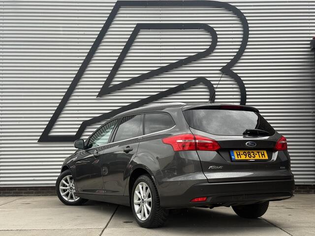 Ford FOCUS Wagon 1.0 Titanium 1e Eigenaar|Navi|Clima|Cruise|Carplay|Stoel+Stuur verw|PDC V+A|APK tot 12-2026