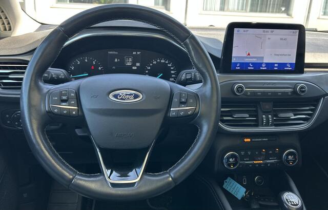 Ford FOCUS Wagon 1.0 EcoBoost Titanium Business 125PK | PANO | 2e Eigenaar | NL AUTO | Onderhoudshistorie | NAP | Elektrische Achterklep | Parkeersensoren | Winter Pack | Stoel Stuur en Voorruitverwarming | Climate Control | Cruise Control | Navigatie | Carplay | 2 