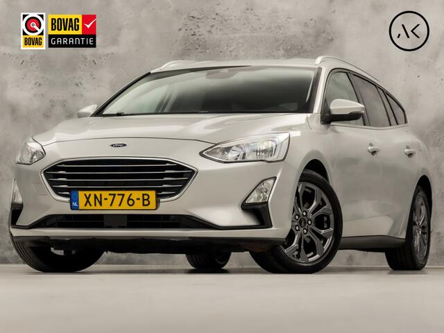 Ford FOCUS Wagon 1.0 EcoBoost Titanium (APPLE CARPLAY, GROOT NAVI, STUUR/STOELVERWARMING, KEYLESS, SPORTSTOELEN, GETINT GLAS, LM VELGEN, CRUISE, NIEUWSTAAT)