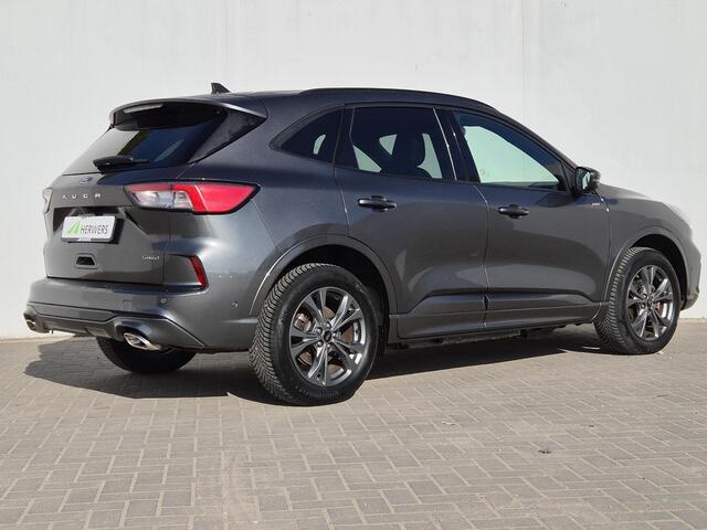 Ford KUGA 2.5 PHEV Plug-in ST-Line X Automaat / Winter-pack / Driver Assistance Pack / Apple Carplay Android Auto / Stuur- en Stoelverwarming / Zeer lage KM Stand / Elektrische achterklep / Achteruitrijcamera / Voorruit verwarming / Achterbank verwarming /