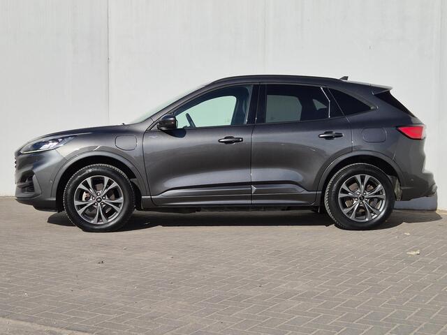 Ford KUGA 2.5 PHEV Plug-in ST-Line X Automaat / Winter-pack / Driver Assistance Pack / Apple Carplay Android Auto / Stuur- en Stoelverwarming / Zeer lage KM Stand / Elektrische achterklep / Achteruitrijcamera / Voorruit verwarming / Achterbank verwarming /