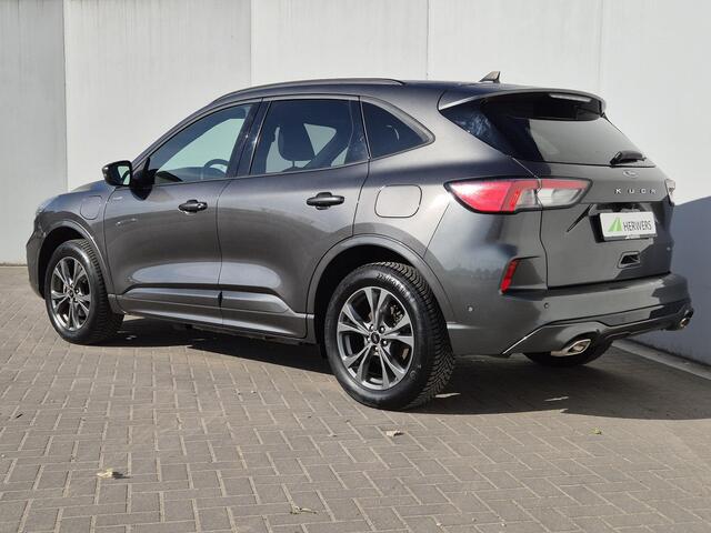 Ford KUGA 2.5 PHEV Plug-in ST-Line X Automaat / Winter-pack / Driver Assistance Pack / Apple Carplay Android Auto / Stuur- en Stoelverwarming / Zeer lage KM Stand / Elektrische achterklep / Achteruitrijcamera / Voorruit verwarming / Achterbank verwarming /