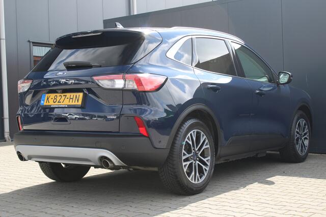 Ford KUGA 2.5 PHEV Titanium X | Incl. 12 maanden garantie | Cruise control | Head-up display | Dodehoek detectie | Elektrisch bedienbare achterklep | Licht metalen velgen | Airco | Parkeersensoren voor/achter | Parkeercamera voor/achter