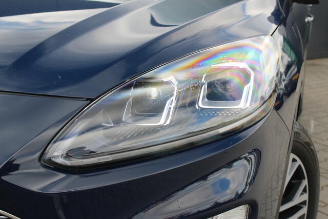 Ford KUGA 2.5 PHEV Titanium X | Incl. 12 maanden garantie | Cruise control | Head-up display | Dodehoek detectie | Elektrisch bedienbare achterklep | Licht metalen velgen | Airco | Parkeersensoren voor/achter | Parkeercamera voor/achter