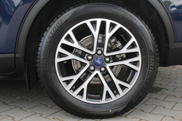 Ford KUGA 2.5 PHEV Titanium X | Incl. 12 maanden garantie | Cruise control | Head-up display | Dodehoek detectie | Elektrisch bedienbare achterklep | Licht metalen velgen | Airco | Parkeersensoren voor/achter | Parkeercamera voor/achter