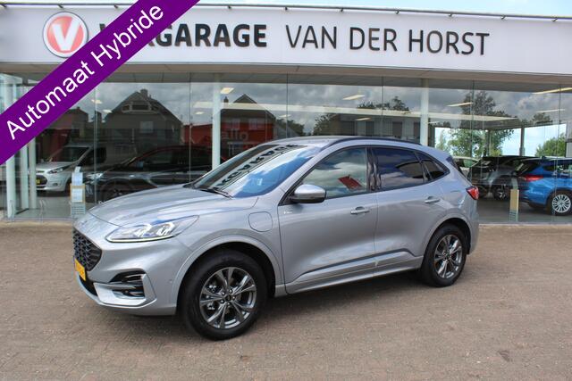 Ford KUGA 2.5-225pk PHEV ST-Line X. 1500kg Trekgewicht Fabr. garantie t/m 04-03-2028 ! Slechts 13.000km ! Autm. airco dual, side- en lane assist, camera v+a, parkeersensoren, elektr. achterklep, stoel-, stuur- en voorraamverw., metallic lak, head-up displ., B&O sou