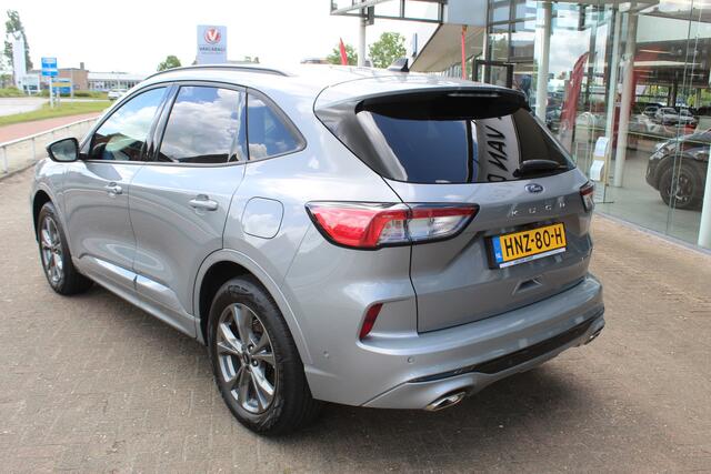 Ford KUGA 2.5-225pk PHEV ST-Line X. 1500kg Trekgewicht Fabr. garantie t/m 04-03-2028 ! Slechts 13.000km ! Autm. airco dual, side- en lane assist, camera v+a, parkeersensoren, elektr. achterklep, stoel-, stuur- en voorraamverw., metallic lak, head-up displ., B&O sou