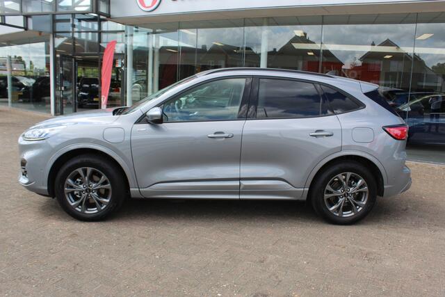 Ford KUGA 2.5-225pk PHEV ST-Line X. 1500kg Trekgewicht Fabr. garantie t/m 04-03-2028 ! Slechts 13.000km ! Autm. airco dual, side- en lane assist, camera v+a, parkeersensoren, elektr. achterklep, stoel-, stuur- en voorraamverw., metallic lak, head-up displ., B&O sou