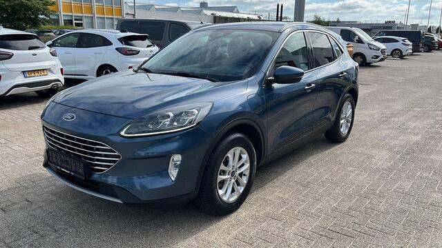 Ford KUGA 2.5 PHEV Titanium X 225pk | Winterpack | Wegklapbare Trekhaak | Elek. Achterklep | 1.500kg Trekgewicht | Half leder | B&O Play