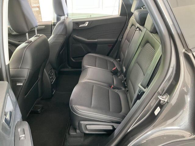 Ford KUGA 2.5 PHEV Titanium X | Weg/Uitklapbare Trekhaak (Elektrisch bedienbaar) | Adaptive cruise control | Winter Pack | Dodehoeksensoren | Bang&Olufsen | Head up Display | Half leder bekleding | 1.500 kg trekgewicht