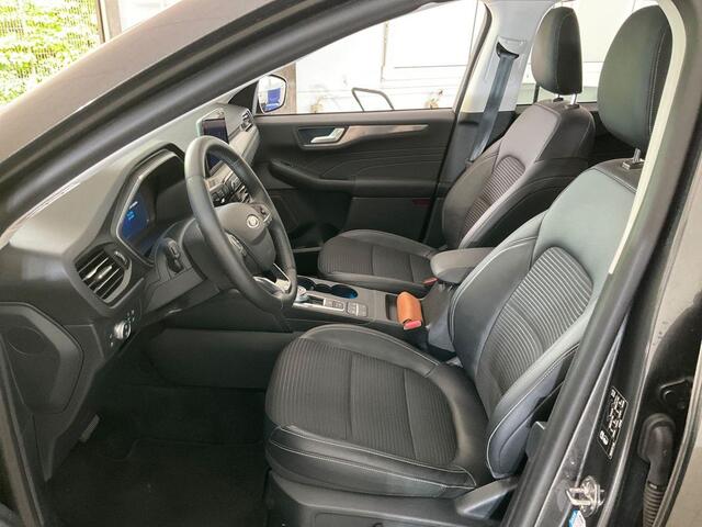 Ford KUGA 2.5 PHEV Titanium X | Weg/Uitklapbare Trekhaak (Elektrisch bedienbaar) | Adaptive cruise control | Winter Pack | Dodehoeksensoren | Bang&Olufsen | Head up Display | Half leder bekleding | 1.500 kg trekgewicht