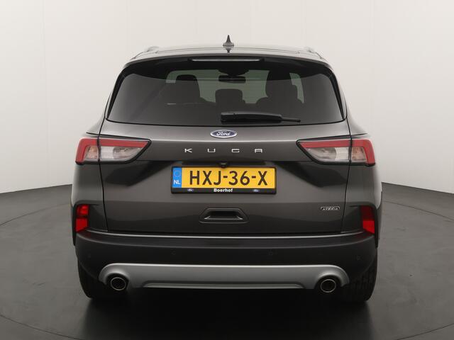 Ford KUGA 2.5 PHEV 225 pk Titanium | Winter Pack | El. a. klep | Adapt. cruise | Adapt. LED | 4 seiz. banden