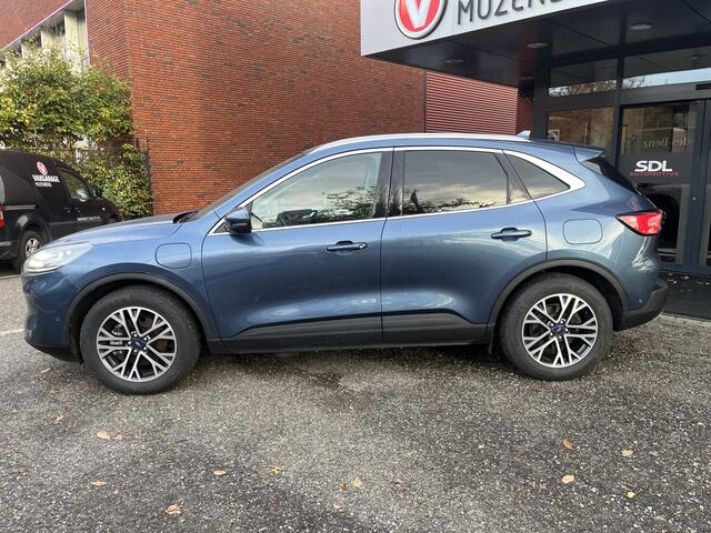 Ford KUGA 2.5 PHEV Titanium X // ADAPT. CRUISE // DODEHOEK // B&O SOUND // KEYLESS // NAVI+CARPLAY // WINTERPACK // FULL LED //