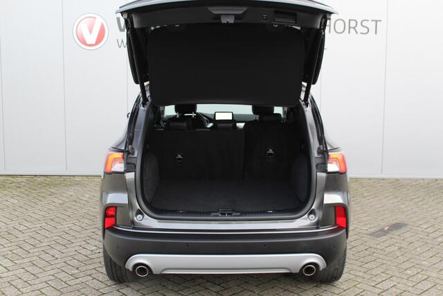 Ford KUGA 2.5-225pk PHEV Titanium X. Hybride rijden voor een reële prijs ! Stoel-, stuur- en voorraamverw., navigatie, telefoonvoorb., B&O soundsyst., side- en lane assist, adapt. cruise cntrl, elektr. achterklep, elektr. verstelb., best. stoel, lm wielen, camera v