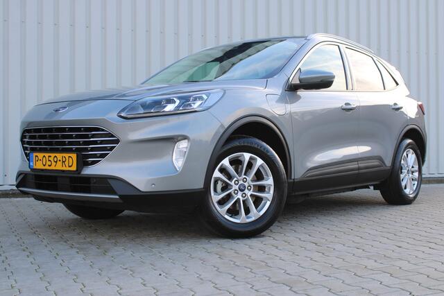 Ford KUGA 2.5 PHEV Titanium X | Incl. 12 maanden garantie | Cruise control | Trekhaak | Climate control | Stoelverwarming voor + achter | Stuurverwarming | Parkeercamera | Apple carplay/Android auto |