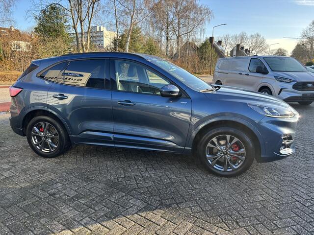 Ford KUGA 2.5 PHEV ST-Line X | Wegklapbare trekhaak | Adaptive cruise control | Winter Pack | Camera | Dodehoeksensoren | Bang&Olufsen | Half-leder | Rode remklauwen | 1.500 kg trekgewicht