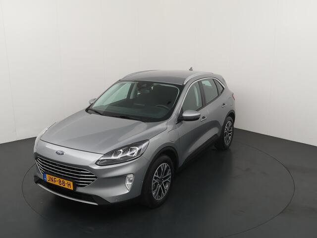 Ford KUGA 2.5 PHEV Titanium | 100% Dealer onderhouden | Winter Pack | Adapt. Cruise | HUD | Camera |