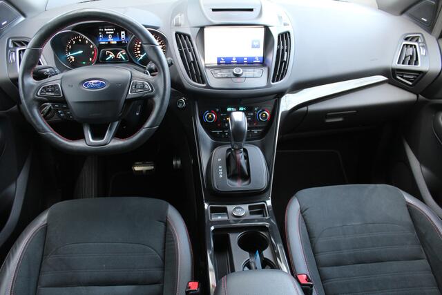 Ford KUGA ST-line 1.5 | Incl. 12 maanden Garantie | Stoel/stuur verwarming | Trekhaak | Achteruitrijcamera | Climate controle | Cruise controle | Navigatie | SONY Audiosysteem | Elektrische kofferbakklep | Parkeersensoren V+A | Keyless GO |