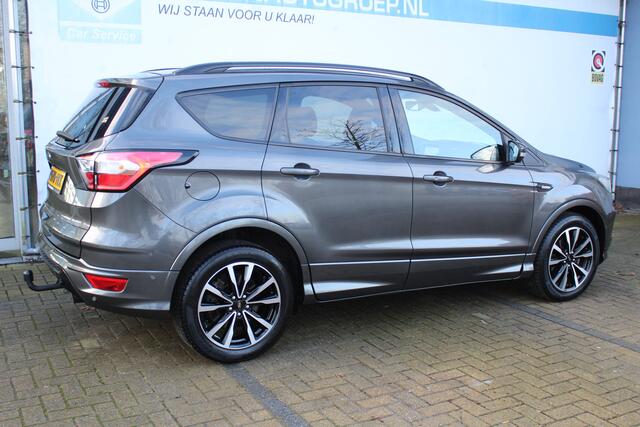 Ford KUGA ST-line 1.5 | Incl. 12 maanden Garantie | Stoel/stuur verwarming | Trekhaak | Achteruitrijcamera | Climate controle | Cruise controle | Navigatie | SONY Audiosysteem | Elektrische kofferbakklep | Parkeersensoren V+A | Keyless GO |