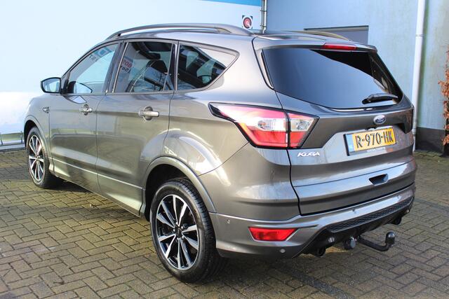Ford KUGA ST-line 1.5 | Incl. 12 maanden Garantie | Stoel/stuur verwarming | Trekhaak | Achteruitrijcamera | Climate controle | Cruise controle | Navigatie | SONY Audiosysteem | Elektrische kofferbakklep | Parkeersensoren V+A | Keyless GO |