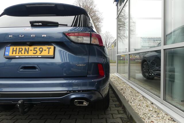 Ford KUGA 2.5 PHEV ST-Line X TREKHAAK (1.500KG), PANO, HUD, WINTER PACK, ADAPT. CRUISE, CLIMA, NAVI, CAMERA V&A, PDC V&A, APPLE CARPLAY/ANDROID AUTO, BLIS, KEYLESS, B&O, ELEKT. ACHTERKLEP, ELEKT. STOEL, 31.652KM
