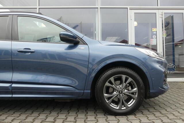 Ford KUGA 2.5 PHEV ST-Line X TREKHAAK (1.500KG), PANO, HUD, WINTER PACK, ADAPT. CRUISE, CLIMA, NAVI, CAMERA V&A, PDC V&A, APPLE CARPLAY/ANDROID AUTO, BLIS, KEYLESS, B&O, ELEKT. ACHTERKLEP, ELEKT. STOEL, 31.652KM