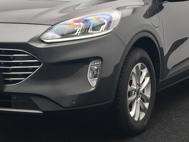 Ford KUGA 2.5 Titanium PHEV 225pk Dealer O.H | Camera | Keyless | Cruise Control | Sportstoelen & Stuur Verwarmd | Navigatie | Virtual | DAB | 17"L.M |