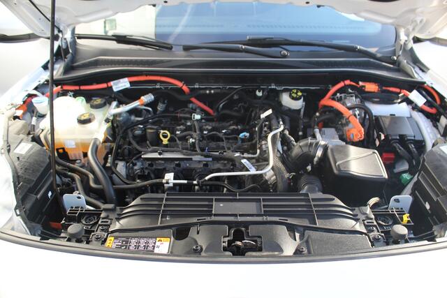 Ford KUGA 2.5-225pk Plug-in Hybrid ST-Line X. Hybride rijden voor een reële prijs ! Autm. airco dual, side- en lane assist, adaptieve cruise cntrl, camera v+a, stoel-, stuur- en voorraamverw., elektr. achterklep, metallic lak, navigatie, telefoonvoorb. etc.