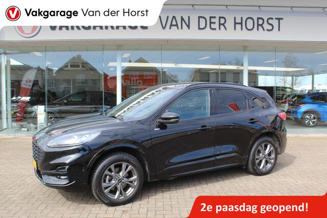 Ford KUGA 2.5-225pk Plug-in Hybrid ST-Line X. Hybride rijden voor een reële prijs ! Adaptive Cruise Control, Stoel- en voorraamverwarming, Climate Control, Metallic lak, Camera v+a, Elektr. achterklep, Side- en lane assist etc.