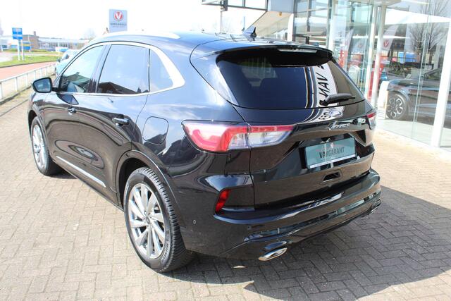Ford KUGA 2.5-225pk PHEV 'Vignale' Plug-in Hybrid Automaat. Luxe hybride rijden voor een reëel bedrag ! Adaptieve Cruise Control, Climate Control, Stoel-, stuur-, voorraam- en achterbankverwarming, Side- en lane assist, Camera, Head-up display etc.