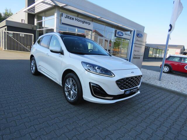 Ford KUGA 2.5 PHEV Vignale NAVI,ADAP CRUISE,PANODAK,ELEKTRISCHE TREKHAAK,LEER,WINTER PAKKET,APP CARPLAY. ARTIC WEISS METALLIC.