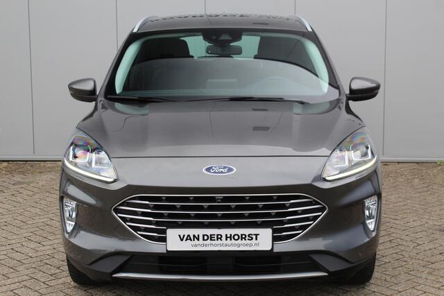 Ford KUGA 2.5-225 pk Titanium PHEV Plug-in Hybrid. Hybride rijden voor een gunstig bedrag ! Stuur-, stoel-, achterbank- en voorraamverw., lane- en side assist, camera v+a, adapt. cruise cntrl, autm. airco dual, camera v+a etc.