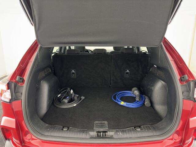 Ford KUGA 2.5 PHEV Titanium (Plug-in) (INCL-BTW) *DIGI-COCKPIT | ADAPTIVE-CRUISE | BLINDSPOT | PARK-PILOT | CAMERA | NAVI-FULLMAP | HEATED-SEATS | COMFORT-SEATS | ECC | CARPLAY | PDC | DAB | LANE-ASSIST | TOWBAR | 18''ALU*