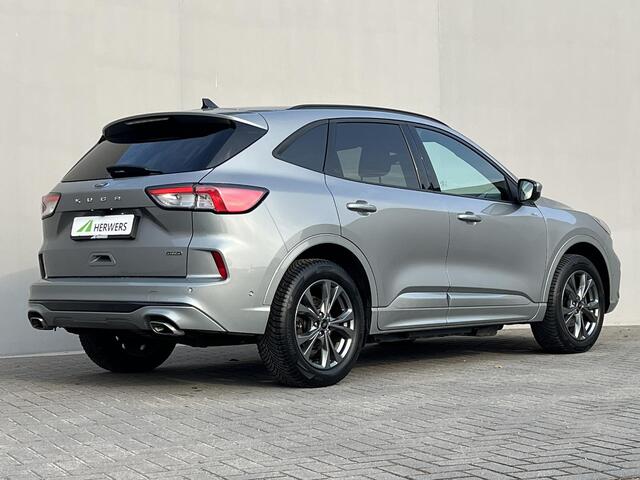 Ford KUGA 2.5 PHEV ST-Line / Dealer onderhouden / 1.500 kg trekgewicht / Navigatie / Stuur-, stoel- en achterbank verwarming / HUD / Camera / 18" LM wielen & All Season banden /