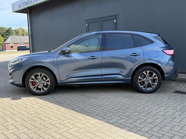 Ford KUGA 2.5 PHEV ST-Line X / Panorama schuifdak / 1.500 kg trekgewicht / Parkeer assistent / Navi / B&O audio / Apple Carplay Android / Stuur-, stoel- en achterbankverwarming / Elektr. stoel & klep / 18" LM wielen /