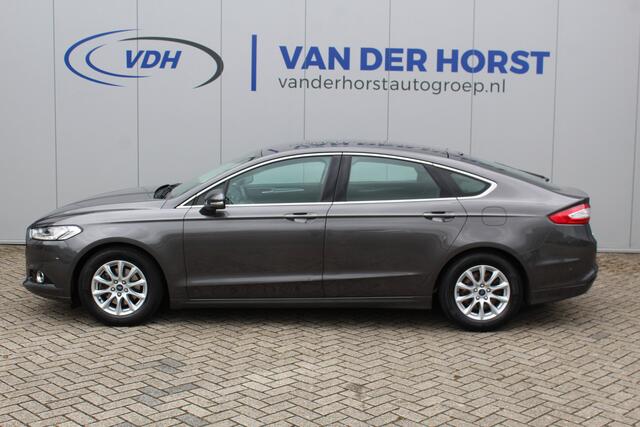 Ford MONDEO 1.5-160pk Titanium. U wenst een comfortabele reiswagen ? Zoek niet verder ! Volautm. airco, metallic lak, LM wln, trekhaak, verwarmd voorraam, LED verl., navigatie, telefoonvoorb., elektr. achterklep, keyless entry/keyless go, parkeersensoren v+a etc.