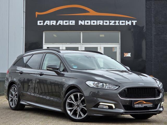 Ford MONDEO Wagon 1.5 ST Line NAVIGATIE|CAMERA|XENON LED|LEDER|KEY LESSGO &ENTRY|GETINT GLAS|TREKHAAK AFNEEMBAAR|18 INCH Maandag tot Vrijdag geopend van 09.00 tot 20.00 uur en Zaterdag van 09.00 tot 18.00 uur