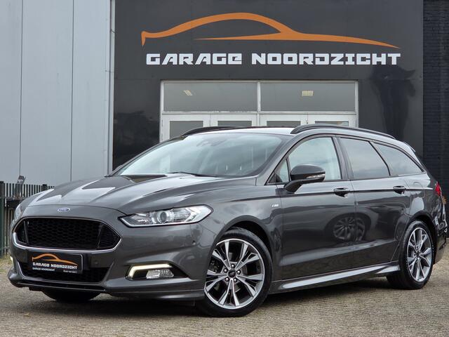 Ford MONDEO Wagon 1.5 ST Line NAVIGATIE|CAMERA|XENON LED|LEDER|KEY LESSGO &ENTRY|GETINT GLAS|TREKHAAK AFNEEMBAAR|18 INCH Maandag tot Vrijdag geopend van 09.00 tot 20.00 uur en Zaterdag van 09.00 tot 18.00 uur