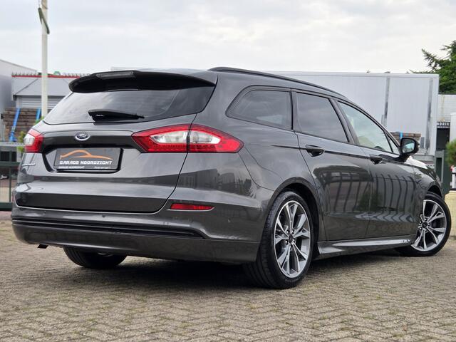 Ford MONDEO Wagon 1.5 ST Line NAVIGATIE|CAMERA|XENON LED|LEDER|KEY LESSGO &ENTRY|GETINT GLAS|TREKHAAK AFNEEMBAAR|18 INCH Maandag tot Vrijdag geopend van 09.00 tot 20.00 uur en Zaterdag van 09.00 tot 18.00 uur