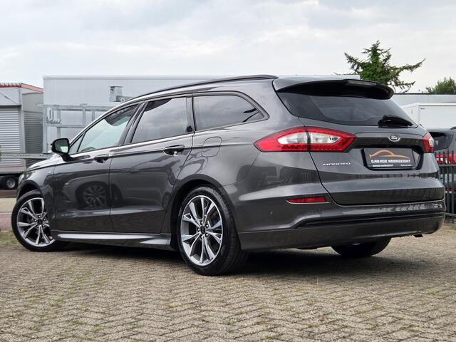 Ford MONDEO Wagon 1.5 ST Line NAVIGATIE|CAMERA|XENON LED|LEDER|KEY LESSGO &ENTRY|GETINT GLAS|TREKHAAK AFNEEMBAAR|18 INCH Maandag tot Vrijdag geopend van 09.00 tot 20.00 uur en Zaterdag van 09.00 tot 18.00 uur