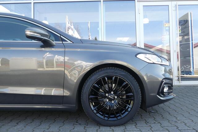 Ford MONDEO Wagon 2.0 IVCT HEV Titanium 18 INCH, ELEKT. TREKHAAK (750KG), WINTER PACK, MEMORY, CRUISE, CLIMA, NAVI, CAMERA, PDC V&A, APPLE CARPLAY/ANDROID AUTO, BLIS, KEYLESS, ELEKT. PASSAGIERSSTOEL, ELEKT. ACHTERKLEP, ADAPTIEVE KOPLAMPEN, LANE ASSIST, 57.812KM