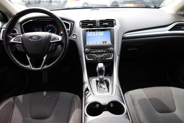Ford MONDEO 2.0 IVCT HEV Titanium RUITVERWARMING ALL-SEASONS NAVI DAB 18"LMV SFEERVERLICHTING 2xPDC NAP ENZ.