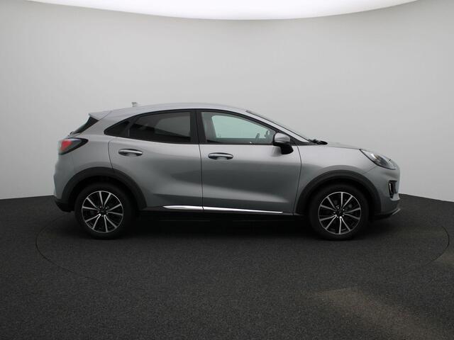Ford PUMA Titanium X 1.0 125Pk | Navigatie | Apple & Android Carplay | Climate Control | Parkeersensoren Achter | B&O Premium Geluidsysteem | Stoel & Stuur Verwarming | Verwarmbare Voorruit | Privacy Glass | All Seasond Banden |