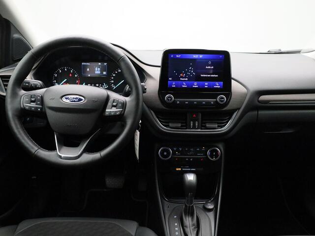 Ford PUMA Titanium X 1.0 125Pk | Navigatie | Apple & Android Carplay | Climate Control | Parkeersensoren Achter | B&O Premium Geluidsysteem | Stoel & Stuur Verwarming | Verwarmbare Voorruit | Privacy Glass | All Seasond Banden |