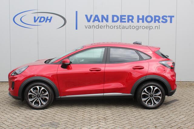 Ford PUMA 1.0 125 pk EcoBoost Hybrid Titanium. Nieuw Model ! Erg fijn rijdende comfortabele hoogzitter ! Slechts 5.750km ! Fab.Gar. t/m 31-01-2029 ! Stoel-, stuur- en voorraamverwarming, Side- en laneassist, Camera rondom, Metallic lak, Navigatie, Telefoonvoorb. et