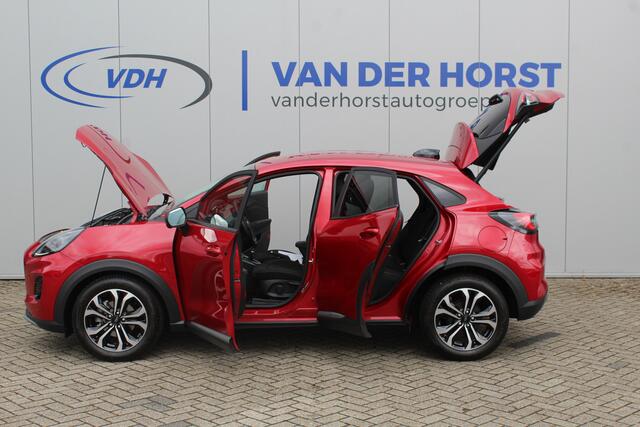 Ford PUMA 1.0 125 pk EcoBoost Hybrid Titanium. Nieuw Model ! Erg fijn rijdende comfortabele hoogzitter ! Slechts 5.750km ! Fab.Gar. t/m 31-01-2029 ! Stoel-, stuur- en voorraamverwarming, Side- en laneassist, Camera rondom, Metallic lak, Navigatie, Telefoonvoorb. et