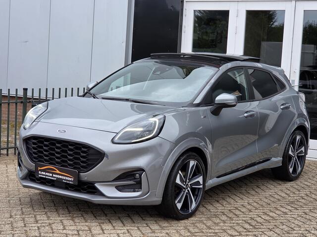 Ford PUMA 1.0 EcoBoost ST-Line X PANORAMADAK|NAVIGATIE|CAMERA|CRUISE CONTROL|HALF/LEDER|ECC/AIRCO|PDC VOOR&ACHTER|STOELVERWARMING&STUUR|19 INCH|DEALERE ONDERHOUDEN Maandag tot Vrijdag geopend van 09.00 tot 20.00 uur en Zaterdag van 09.00 tot 18.00 uur
