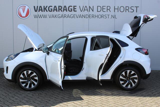 Ford PUMA 1.0-125pk EcoBoost Mild-Hybrid Titanium. Fabr. garantie t/m 24-03-2029 ! Eén van de fijnst rijdende auto in z'n klasse ! Autm. airco, stoel-, stuur- en voorraamverw., cruise control, LED verl., navigatie, telefoonvoorb., DAB radio, Apple carplay/Android a